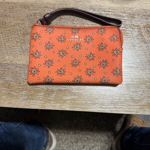 Coach Orange Wristlet with Paisley Design
